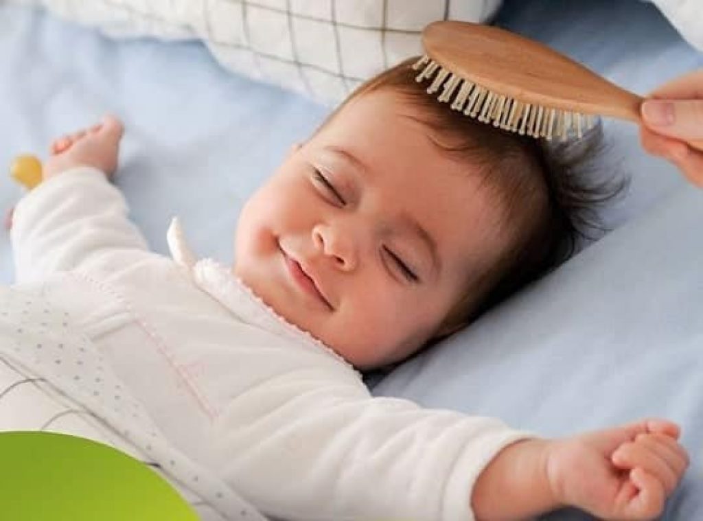 Organic baby hairbrush for soft tresses